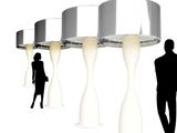 a silhouette of a man and a woman standing in front of a row of lamps
