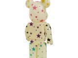a white bear figurine with stars all over it