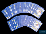 a lot of pokemon playing cards on a black background