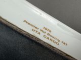 an image of a close up of a plate with a name on it