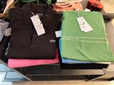 a pile of clothing on a table with a price tag on it
