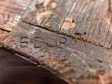 a close up of a piece of wood that has a piece of wood on it