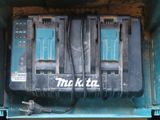 two batteries in the back of a blue box