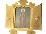 un cadre doré contenant une image de la Vierge Marie et de l'Enfant Jésus