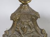 pair of antique brass candlesticks on stand with ornate decoration