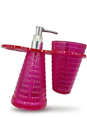 un distributeur de savon et un porte-brosse à dents sur fond blanc