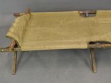 a wooden bench with a metal frame on it