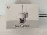 a white box with a picture of a smart camera on it