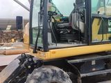a picture of a construction vehicle parked in a lot