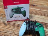 a box with a game controller on it on a table