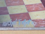 a picture of a window with a checkered pattern on it