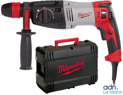 a close up of a drill with a tool in a case