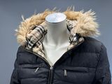 an image of a jacket with a hood and a fur lined collar