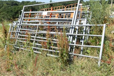 a fence that has been placed in the middle of a field