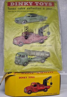 a box with three different toy cars in it