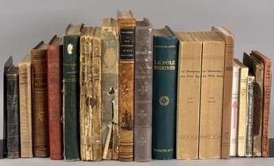 a lot of old books that are on a shelf