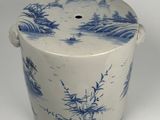 an image of a blue and white pot with a lid