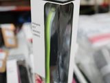 a box of wii remotes sitting on top of a table