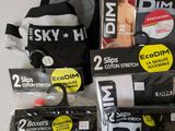 several pairs of men ' s underwear sitting on top of each other