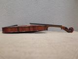 a violin that is sitting on a table