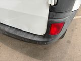 an image of a white truck parked in a parking lot