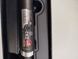 a close up of a black object in a black case