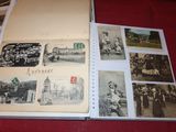 an open book with pictures of people on it sitting on a table