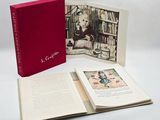 an open book with a picture of a woman in a library