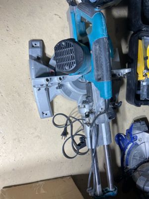 many tools that are laying out on the floor