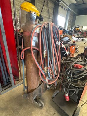 an image of a welding station with a lot of tools