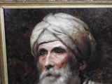 portrait of an old man with a white turban and a white beard