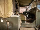 an old military vehicle with a star on the side