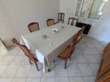 a white table with a white table cloth on it