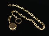 a gold chain with a locke and a ring on it