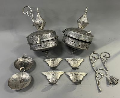 several pieces of silverware are sitting on a table next to scissors and scissors