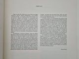 an open book with a picture of a cat on it ' s cover