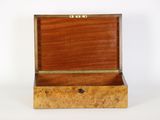 a small wooden box with a drawer on top of it