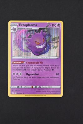 a close up of a pokemon card on a table