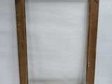 an old wooden picture frame with a white background