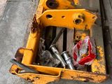 a box of tools sitting on a pallet on the sidewalk