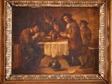 an old painting of a group of men sitting around a table