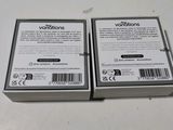 the two boxes are sitting on the table next to each other