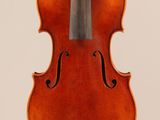 an old violin with a bow on a white background