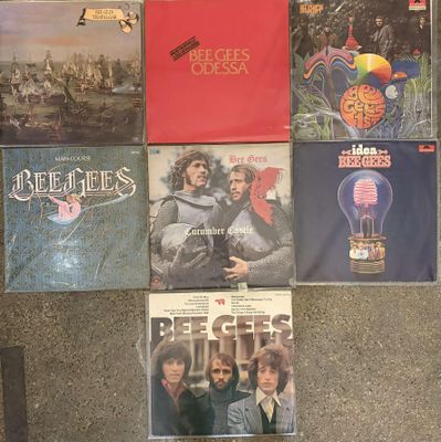 a lot of records on the floor on the floor