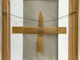a picture of a cross made out of a piece of cardboard