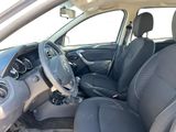 the interior of a car with a steering wheel and a dashboard