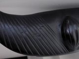 a close up of a bike handle with a black handle