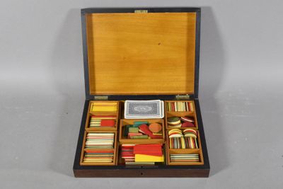 a wooden box with a variety of items in it