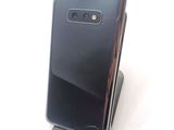 a close up of a cell phone on a stand
