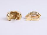a pair of yellow gold cufflinks